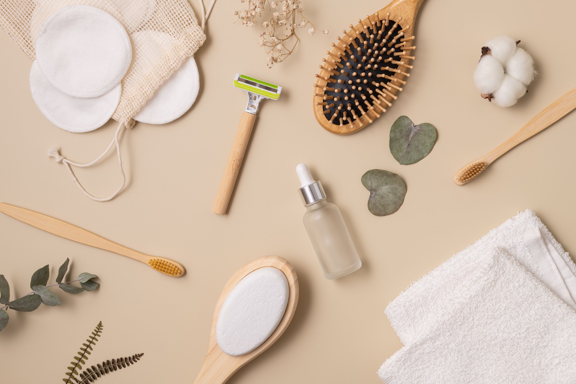 Eco-friendly beauty essentials arranged on a neutral background